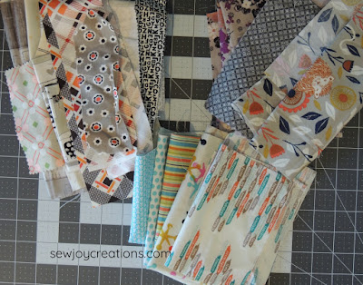 neutral or low volume prints for churn dash fabrics low volume prints liberated churn dash quilt