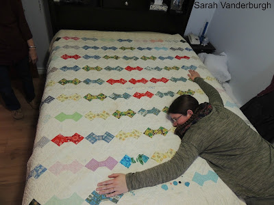 sister claiming the quilt sister on quilt