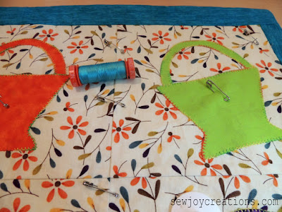 Pick one color to quilt with and start - it's quicker! blue thread for quilting