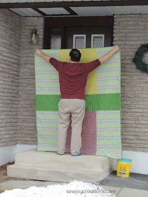 back of quilt with husband