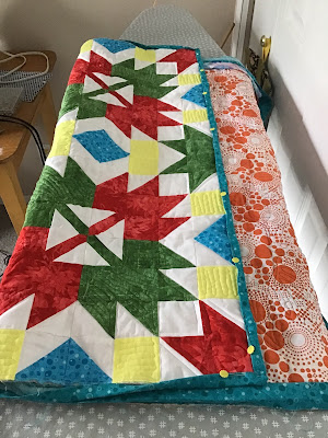 Ready to bind the Celebration Leaves after doing free motion quilting
