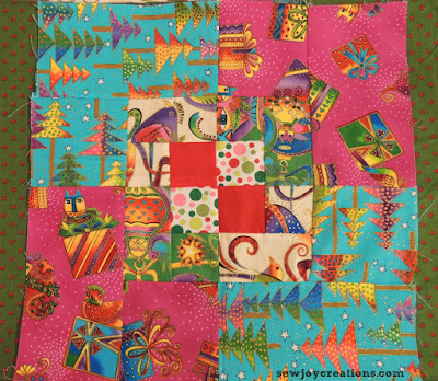 Bright bold laurel birch christmas fabrics in this scrappy bento box! lauries scrappy bento