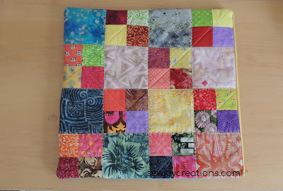 quilted patchwork side of cushion cover scrappy four patch blocks quilted cushion cover