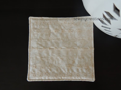 floating stitches and more on this coaster neutral stitches decorative stitched coaster