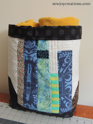 quilted basket made of a rowalong row quilted basket