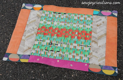 I like how the bold colours play off the asphalt driveway backdrop! Bold Delight placemat in Story by Carrie Bloomston Bold Delight placemat in Story