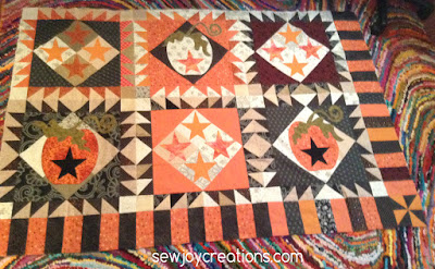 These pumpkin blocks still make me swoon! bottom panel of Halloween 1904 quilt
