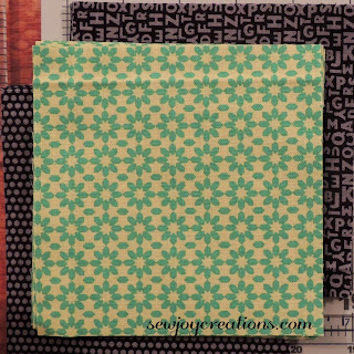 two complimentary background fabrics
