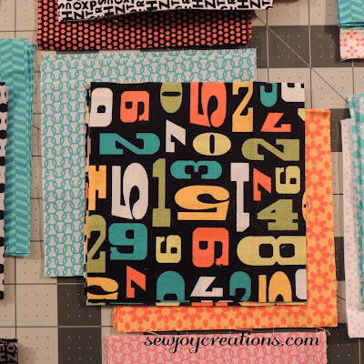 print with many colours offers chance to play with colour in the background too