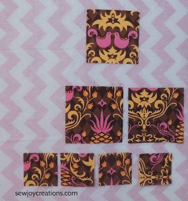 dark rust pieces cut and on my design wall dark rust fabric fussy cut monthly color challenge