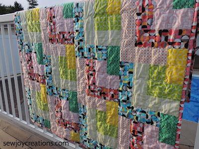 Dropping In quilt in Good Vibes fabric Dropping In quilt serpetine quilting