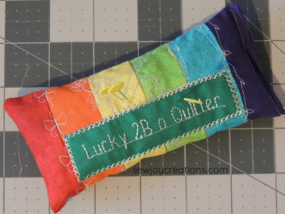 Lucky 2B a quilter rainbow pincushion rainbow stitched pincushion PFAFF performance icon QUILTsocial
