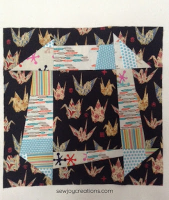 first small churn dash for new quilt low volume churn dash block liberated churn dash quilt