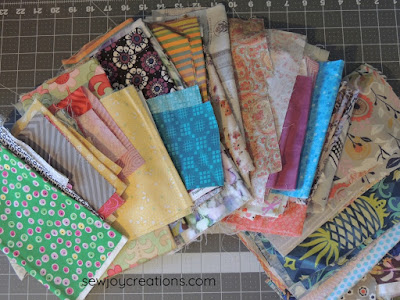 all of the fabrics I pulled for the churn dashes fabric pull churn dash fabrics