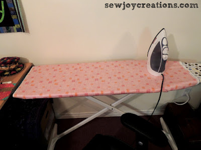 My lazy recovered ironing board lowered to table height lowered ironing board