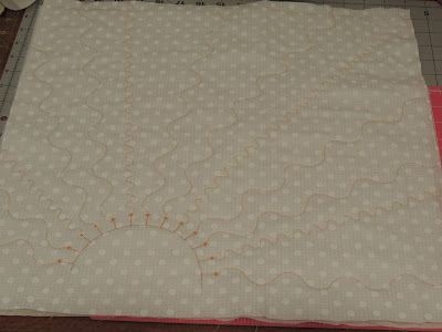 Sun rays made out of serpentine stitching serpentine stitches quilting stitches PFAFF performance icon