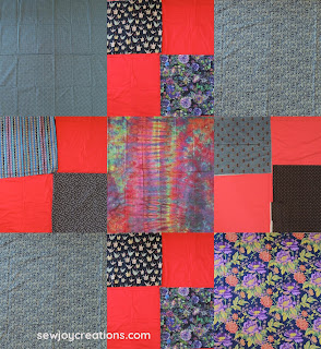 photo collage of fabrics I'm using for my 2nd liberated churn dash quilt background fabrics dark prints and reds liberated churn dash quilt