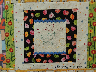 eat me note on madhatter tea party quilt handstitch quilt block with ric rac on alice in wonderland quilt