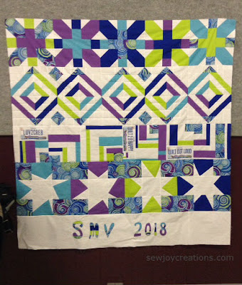 modern round robin applique strip pieced signature