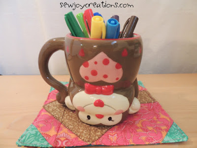 I'm sharing my Lucky Monkey Tail Mug Rug this week at QUILT Social! monkey mug on mug rug