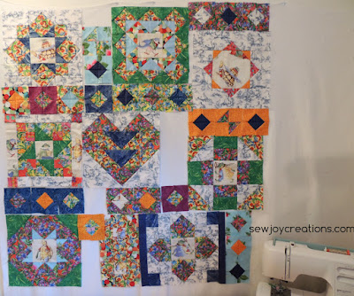 Having blocks with the same background together calmed the quilt down a bit like blocks beside each other