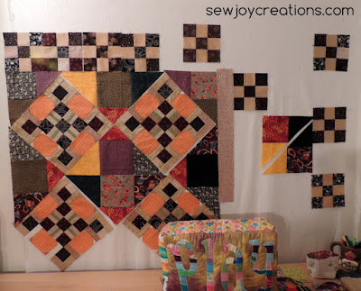The pumpkin blocks would look great as a twin quilt top! pumpkin blocks with setting triangles as quilt top