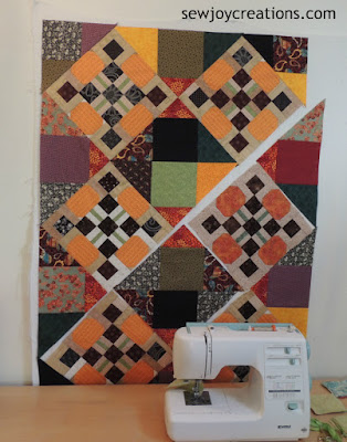 half of middle section of pumpkin block quilt sewn together