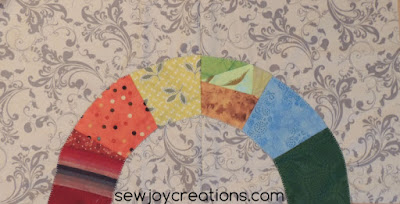Two modified wedding ring blocks make one happy rainbow Another rainbow block for my Roosting Round Robin