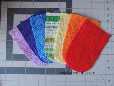 rainbow of quilted banner sections quilted banner sections rainbow free motion quilting samples