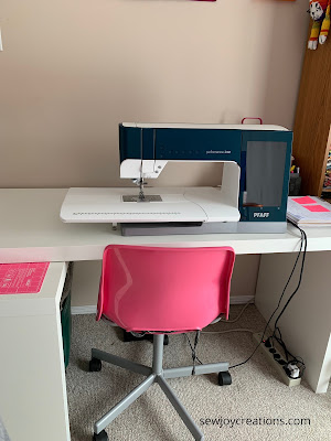 PFAFF performance icon and pink accessories