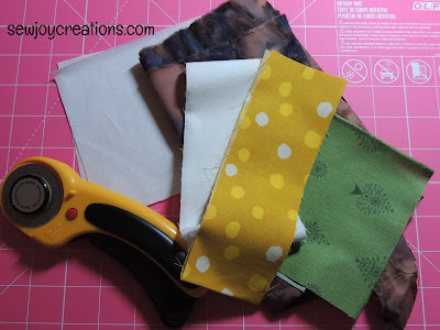I used fabric pieces from my stash fabrics for sunflower block