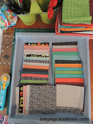 Fabrics cut and stored in their own bin makes it easier to have several projects on the go at once